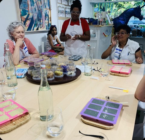 Students making soap at a Toronto workshop